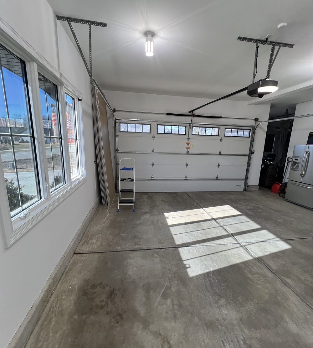 Bright garage with a row of side windows after a window film install